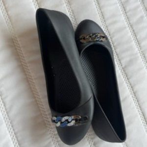 Black flats Crocs brand size 10